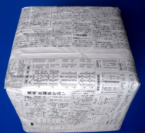 In addition, the commodity is wrapped with newspaper